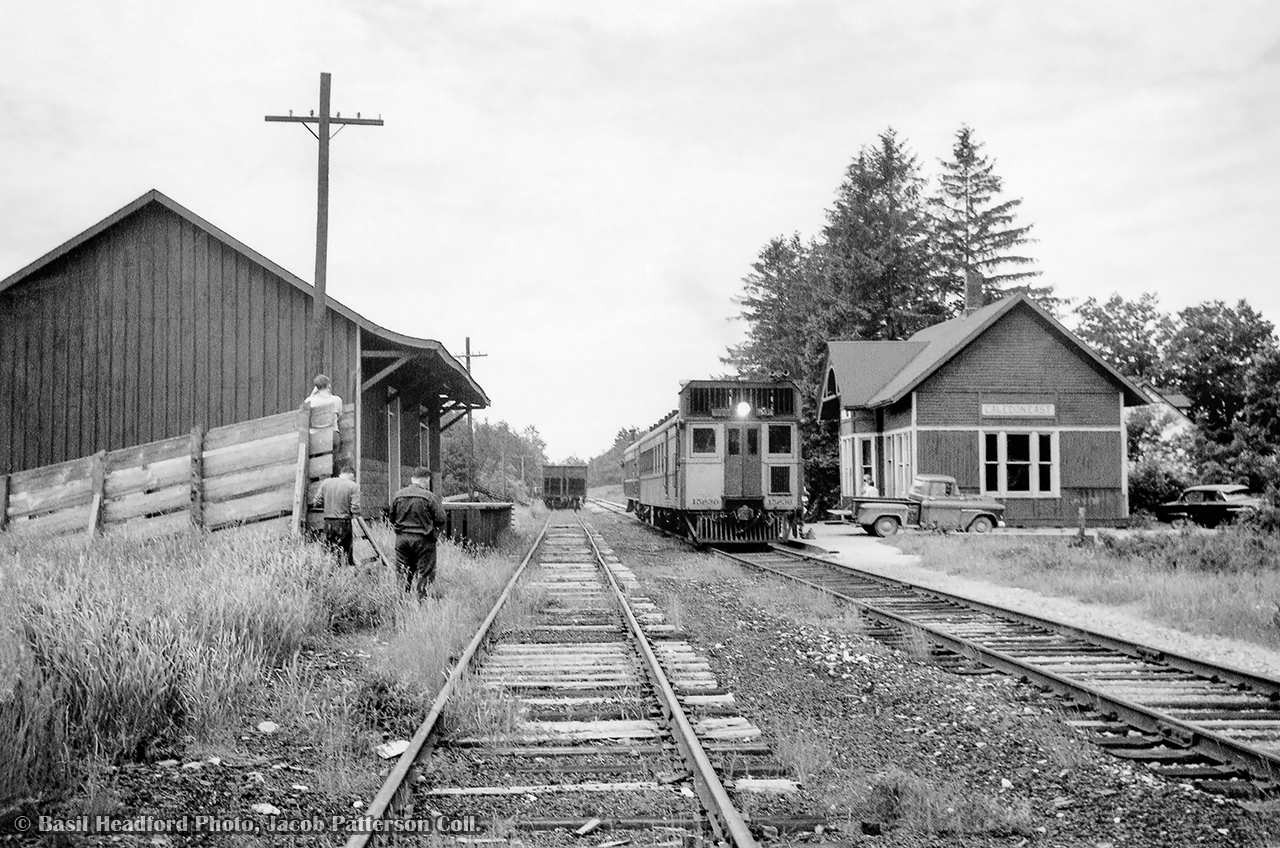 Burlington to Allandale* train 661 makes its stop at Caledon East, exchanging passenger, mail, and express before continuing on their way.  CNR oil-electric 15836 and trailer C1 only have a short time left rattling along the old Hamilton & North Western right of way before this service draws to a close on July 2, 1960.  The Caledon East station, built by the Grand Trunk in 1903, survived until demolition in November 1971.

Though undated, spring 1960 can be estimated based on the equipment assigned to 661/662.  Per Charles Cooper's book, Hamilton's Other Railway, oil-electric cars began operating on this run in 1933 with CNR 15830 and a trailer, as seen on numerous branchlines.  This equipment remained until January 1952, when streamlined CNR D-1, and trailers C-1 and C-2 were assigned to the run.  The unique equipment served the communities along the line until the end of 1958, when D-1 and C-2 were transferred to northern Ontario, with CNR 15832 and trailer C-1 replacing it until a time near the end of service.  As seen above and in other photos by Ian MacDonald (see below), 15836 appears to have been the last oil-electric assigned to the run with trailer C-1.  One constant throughout the years of the oil-electrics was their mechanical issues, resulting in conventional equipment frequently relieving them of their duties, as captured below by Clayton Morgan.

*Over the course of its daily except Sunday trip, this equipment carried six train numbers: 660 (Hamilton - Burlington), 661 (Burlington - Allandale), 61 (Allandale - Meaford), 62 (Meaford - Allandale), 662 (Allandale - Burlington), and 663 (Burlington - Hamilton).


Scenes from this operation:
CNR 15836 arriving at Caledon East (Ian MacDonald)
15836 and C-1 southbound at Stewarttown (Ian MacDonald)
Conventional equipment at Inglewood (Clayton Morgan)
CNR D-1 in its later appearance (Al Chione)


Basil Headford Photo, Jacob Patterson Collection.