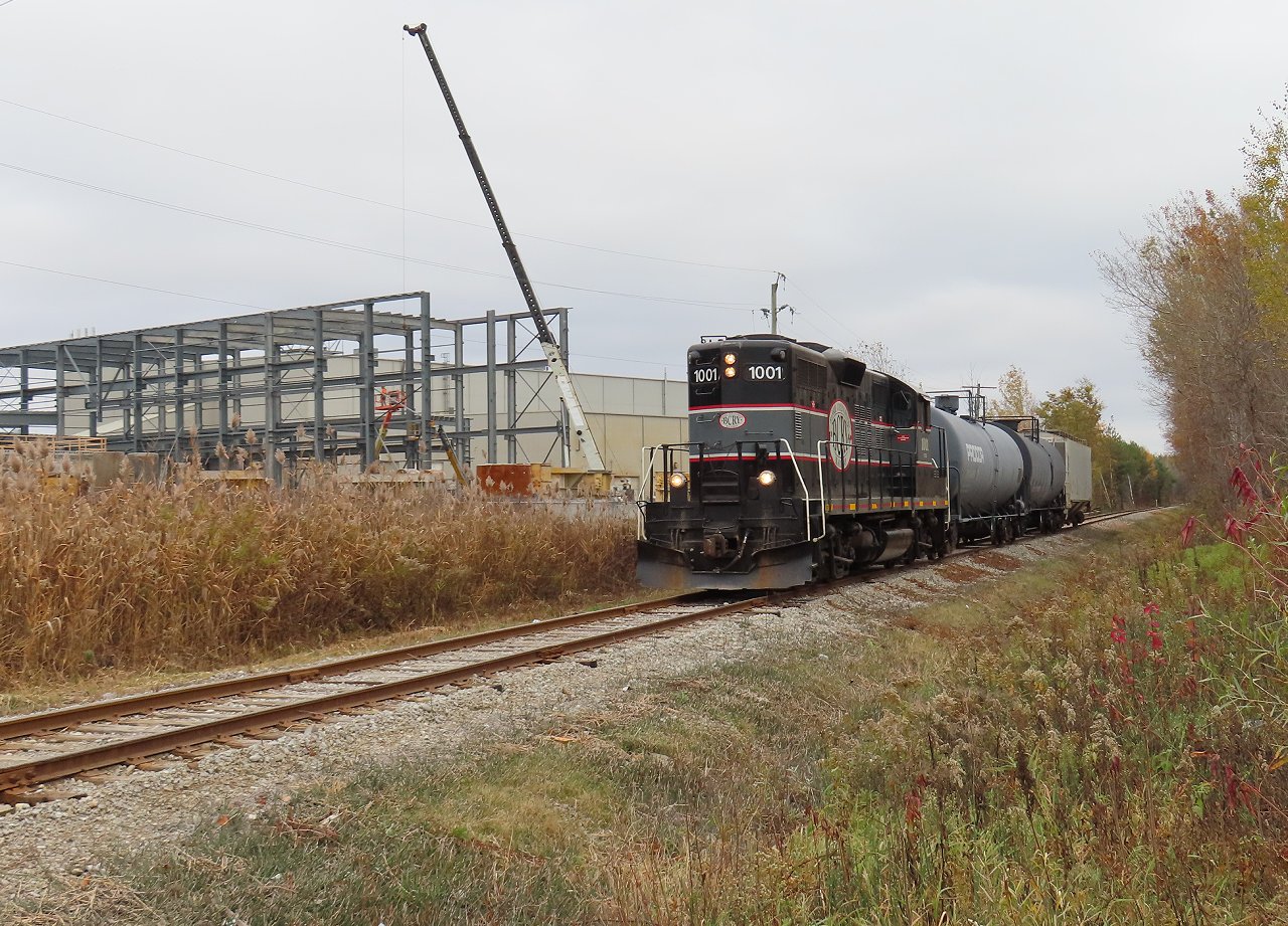 Returning to Utopia with three cars, 1001 passes the ever expanding Decast plant. Decast manufactures all kinds of concrete infrastructure items such as sewer pipe, culverts, tunnel segments and bridge girders. In my working days I prepared architectural drawings for several additions for this plant. Development fees for new buildings in Essa Township are huge but don't apply to additions, so the question was always "Which direction are we expanding in this time?"