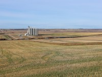 Z 11531 15 cruises past the Grains Connect terminal in Huxley, Alberta on the scenic Three Hills Sub 