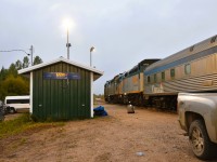 <b> Before sunrise </b> <br>
Before the sun comes up and turns off the stations photocell lights, VIA 692 The Hudson Bay is making its scheduled stop at the remote northern Manitoba community of Ilford. <br>
Two passengers to board, a few bags to load, and we'll be on our way south in a few short minutes. Just enough time to grab a few pics in this quaint little village.