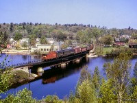 Shortly after the passage of the <a href=https://www.railpictures.ca/?attachment_id=52400>Super Continental,</a> mixed train M215 from South Parry to Capreol gets underway behind GMD GP9 4334.<br><br><i>Scan and editing by Jacob Patterson.</i>