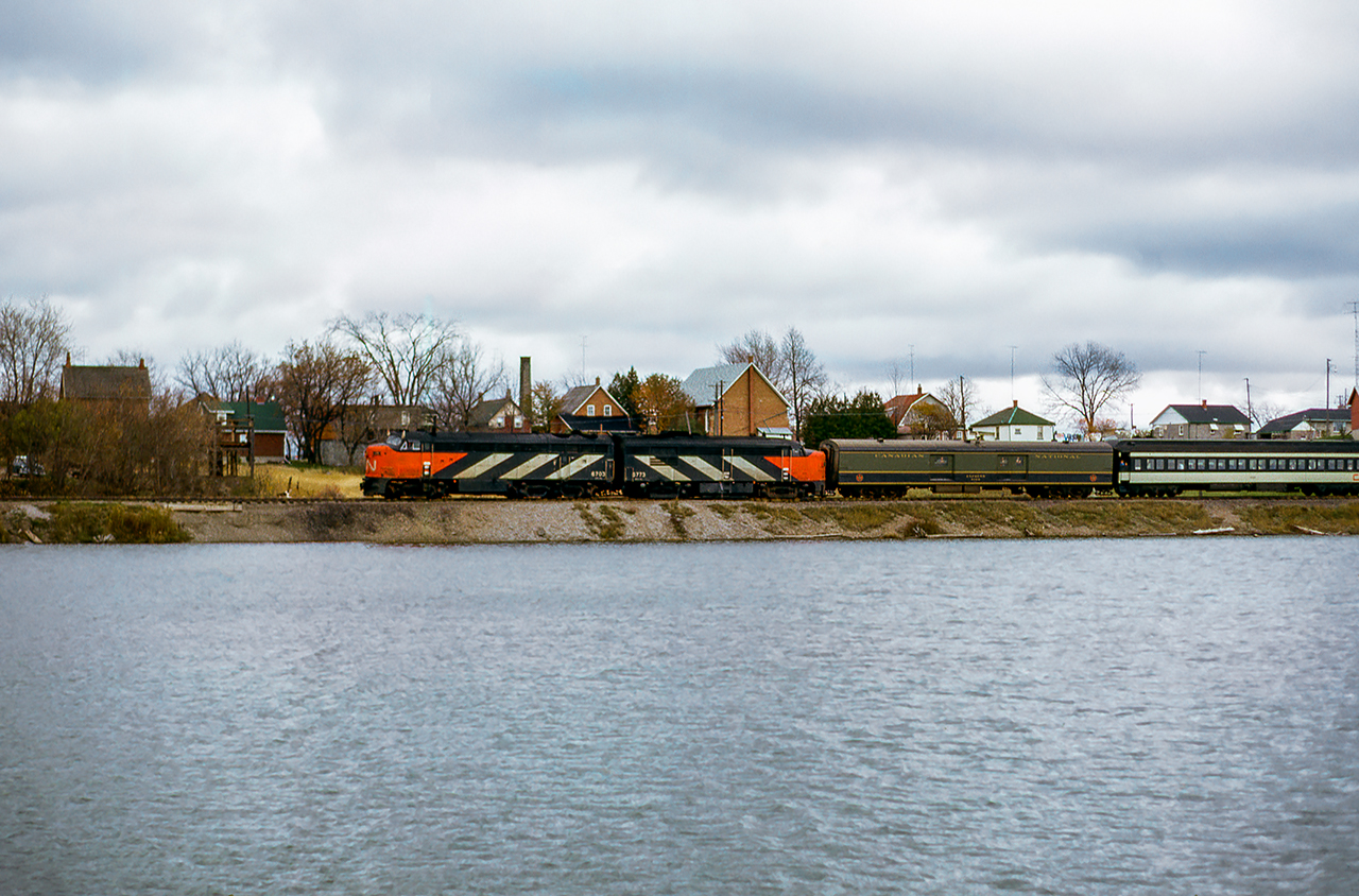 The weekend of October 23 & 24, 1965 saw the Upper Canada Railway Society run an excursion on each of the class one railways. The Sunday trip running on the Canadian National behind CNR CPA-16-5 6704 and FPA-4 6774 departed Toronto Union station for Georgetown via the Weston and Halton Subs, before heading up to Allandale along the Beeton Sub returning to Union Station via the Newmarket. Here, the train passes the pond at Tottenham.

The Saturday excursion on the Canadian Pacific ran from Toronto - Hamilton - Guelph Junction - Orangeville - Toronto, seen here at Cataract.



Scan and editing by Jacob Patterson.