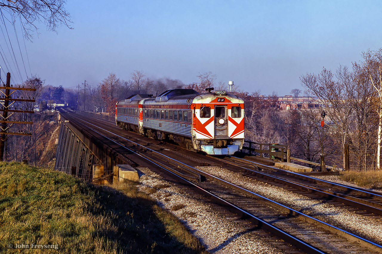 CPR's employee shuttle RDCs are seen westbound over the west leg of the River approaching the Wicksteed Avenue grade crossing and Leaside station.  The shuttle ran between Agincourt Yard, Leaside, North Toronto, and Lambton Yard.

Scan and editing by Jacob Patterson.