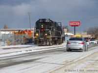 Pictured is GIO  lifting the last car (to date) out of Kemira in St. Catharines on February 29, with traffic rushing along Berryman Ave and photographers scurrying everywhere. (I'm amazed none are in my shot). This would NOT be the last train on the line. After GIO left the line for dead, dimensional loads had to come out of Trenergy and the <a href=http://www.railpictures.ca/?attachment_id=54525 target=_blank>last moves to date</a>, would be in June 2024 where the trackmobile in Dean's photo would take loads down the N&ST Spur to Merriton. The line hasn't been officially given up/discontinued by CN nor ripped out and anything is possible until it's ripped out. Despite what some folks have been saying, this wasn't the last movement on the Grantham Spur. This probably won't be the last train on the north end of the Thorold sub either.. only time will tell for sure. People did the same with OSR left the Cayuga spur... folks - don't proclaim the last train until you know for sure. No need to rush your proclamations as history has a habit of proving us wrong if we do :)