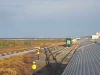 <b> Ladies & Gentlemen, Welcome to Churchill </b> <br>
VIA 693 The Hudson Bay makes its 5 mph reverse movement from HBR Churchill South, through the recently rehab'd Churchill yard, towards the stately station in Churchill, MB. <br>
The day is starting out great with sunshine and just a bit of hazy sky. <br>
Not much in the yard this early September morning except a loaded GREX Dump Train, a few tank cars, and a single bulkhead flat loaded with rolls of Geotextile fabric for laying down during roadbed rehabilitation. <br>
I'm just 10 minutes away from detraining and starting a full day of exploring the town and HBRY infrastructure once again. :-)