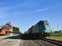 <b> Stately Manor </b> <br> 
The VIA station/Railway Museum at Dauphin is an imposing structure that has been beautifully preserved. <br>
After departing Winnipeg, this first scheduled stop for VIA 693 The Hudson Bay offers passengers an opportunity to stretch their legs and enjoy a beautiful afternoon on the platform and surrounding area. <br>
Unknown at this point in the journey was that the lead unit VIA 6433 would be switched out to the trailing position this evening at The Pas, MB due to a radio failure, making us 6+ hours late the next morning.