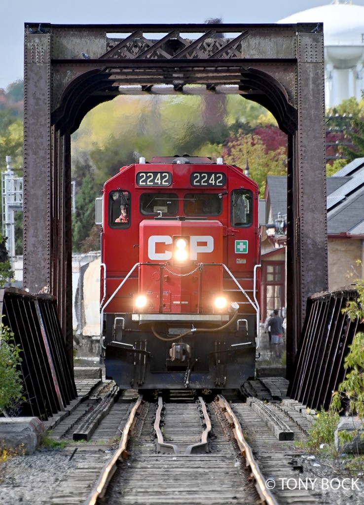 On its way to Havelock and the nepheline syenite mine at Blue Mountain, CP train T08 crosses the Otonabee River bridge in downtown Peterborough, on October 9th, 2024.