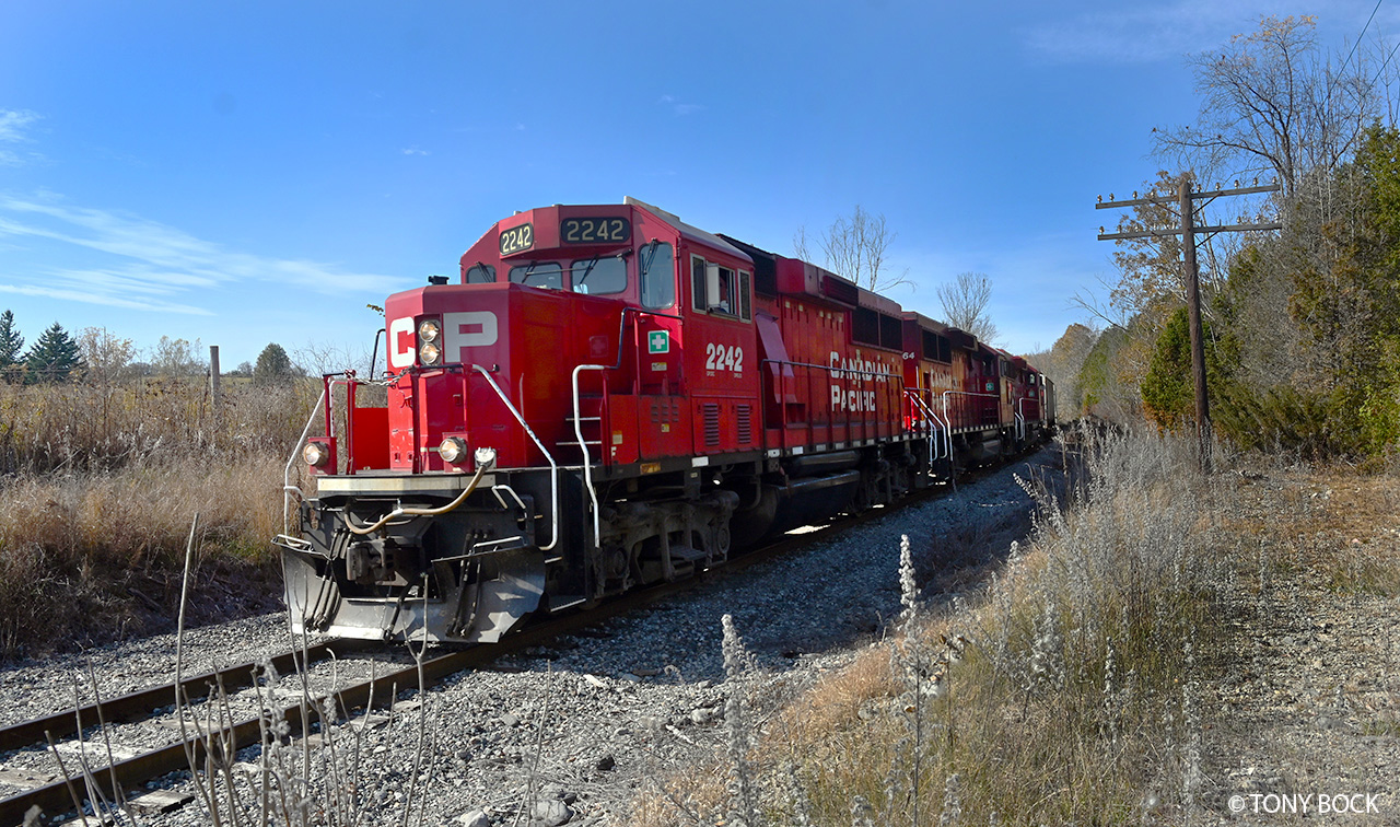 With EMD GP20C-ECO 2242 leading, T08 is on its way to Havelock and Blue Mountain with a short consist today (October 22), just east of Peterborough.