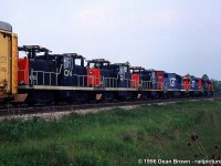 CN 333 had CN SD70I 5607, GTW SD40-2 5936, GTW GP38-2 5851, and three CN Z-5-A 6725, CN 6726, and CN 6727 in tow being shipped from Montreal to New York.