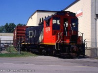 CN 549 with CN 1374 works at Eastchester on the Grantham Spur in St. Catharines switching the warehouse back in 1996.