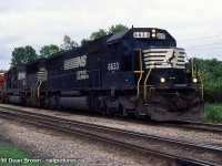 NS 445 with NS 6633 and NS 6679 on the siding at Dain waiting to get their train built by CN.