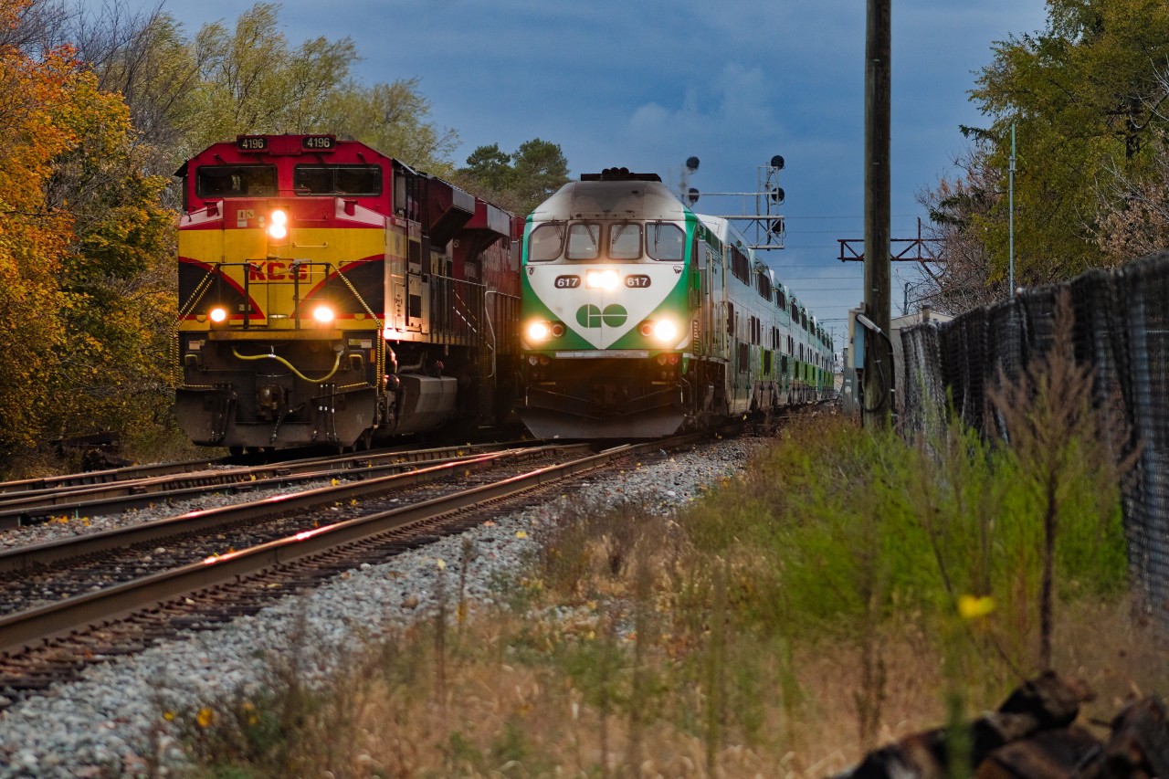 134's conductor had gone for a train-long walk to inspect an open door 10 cars from the tail that was called in west of Meadowvale in the middle of the morning Milton Line rush. The engineer killed time being friendly with railfans, even doing the courtesy of flipping headlight switches whenever they saw a lens raise at the motive power. One of the 134 lead locomotive's EMD 710 brothers in the passenger sector powers the second last Milton Line service of the morning, overtaking them just past Streetsville Junction where 134 had initially stopped, but then pulled up to the next crossing to make the conductor's walk shorter without disturbing commuting traffic to the nearby Dolphin Senior Public School.