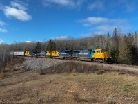 ONR Englehart-North Bay train 214 is captured traversing the rugged Northern Ontario landscape with SD75i 2102 in the lead. Trailing units were 2120 (SD70M), 2104 (SD75i), and 2121 (SD70M).
<br>
At North Bay, the crew would switch consists and lift SD75i 2105 from the shop before heading north to Englehart as train 113.