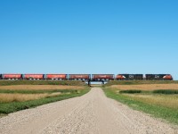 CN 508 slowly trundles it's way along the Glenavon Subdivision with a sharp looking block of exGovernment grain cars up front.  