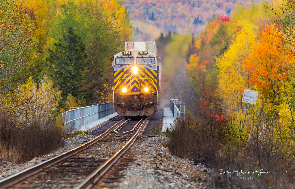 CN 121 rumbles across the Foley Brook Trestle in New Denmark, New Brunswick, as Fall is near it's peak in Northern New Brunswick.