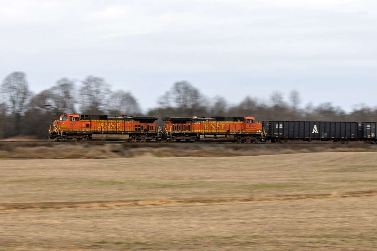 You never really know what might happen. The long story....two days ago, Toronto-Detroit 135 (CP BNSF)had the CP engine fail around Milton. BNSF 4066 was dispatched from London or Ayr where it had been the power on empty rack train 734. At some point after that, 238's 2 CP GE's that were sitting in London were put on 135...or it's return 134. No idea what happened to the failed CP, but the 2 BNSF's were left to power 238 from London to Welland. 

Which gets us to their return trip to London...in terrible light, so I gambled on 1/20th in the wind and tried to pan. In an mostly GE world, you try to find things to keep it interesting.