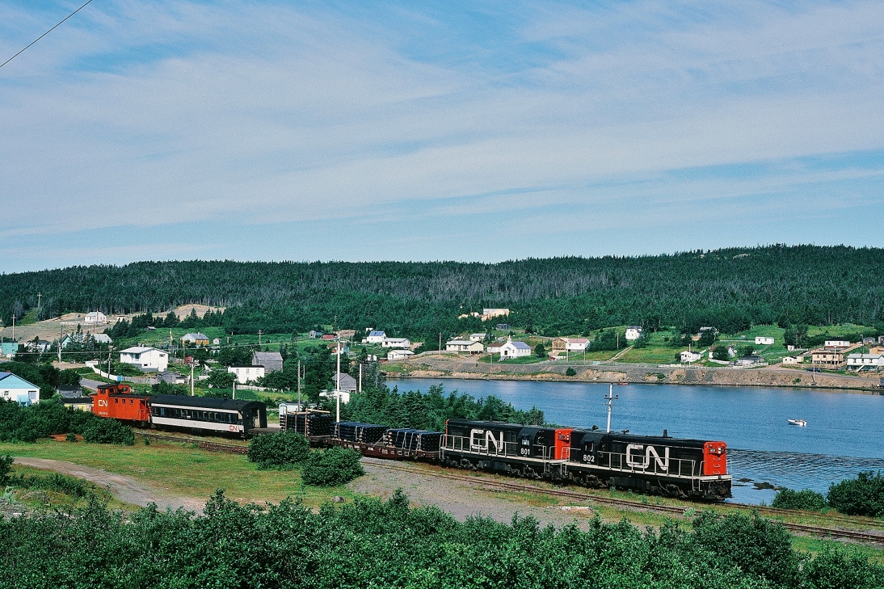 ….......…........…......The Rock.............................







Wednesday only TT #206 rolls through Southern Bay, enroute to Bonavista, at 09:35 on August 4, 1982, Kodachrome by S.Danko  



Consist: 



TT #205 G-8 #802-801 – two loads of pipe -coach #754 – caboose #6061