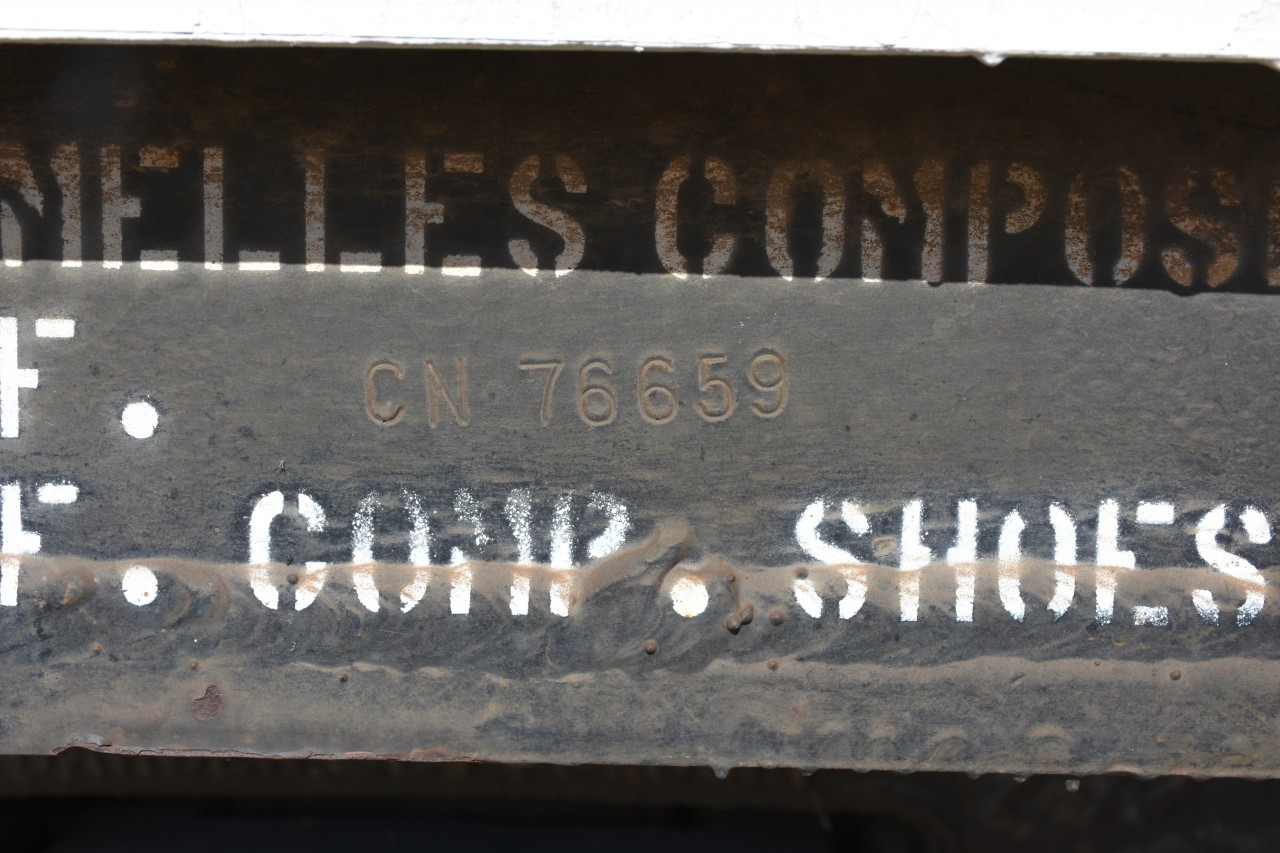 It's there somewhere  
Even though the CN transfer van on static display at the Canora, SK station/railway museum did not have a road number stenciled on it, I was able to easily locate it by looking on the side/end of the car body frame where most CN rolling stock (at least at one time) had the car i.d. stamped. 
Maybe on my next trip to Churchill I'll find the van fully painted, logo'd, numbered, and lettered. :-)