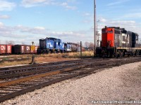 CR SW1500 9528, CR SW1500 9567, and CN GP9 4522 in Fort Erie.