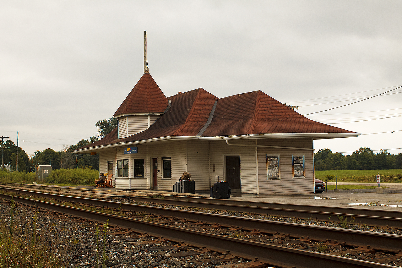 There are two things I likely will never see again at what once was a busy junction station: passengers waiting for the 'hopefully on time' train, and the interior waiting room of the station. Of course, it had been about 20 plus years since this station received the 'VIA' makeover, with their typical red shingled roofing from that era. Somehow, from the sagging exterior, leaky roof inside the waiting room, and overall dilapidated appearance I feel like this country gem is on borrowed time.