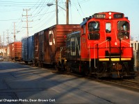 CN 550 with CN SW1200RS 1311 at GM Ontario Street Plant on Carlton St switching the plant.