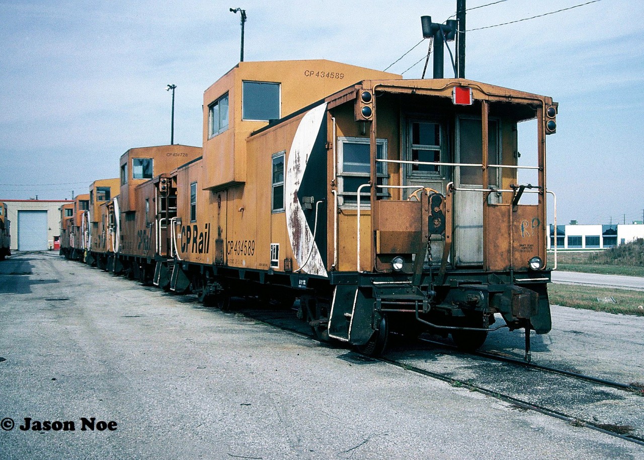 Viewed during an October morning, the caboose shop at CP’s Toronto Yard in Scarborough, Ontario is full of cabooses awaiting attention or their next assignments.