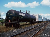 A CP work train is viewed sitting in the village of Ayr, Ontario on the Galt Subdivision. I don’t have any information on why the train was set-off here, as it caught us by surprise at the time. Also, I believe this was the first and only time I ever photographed a CP Rail tank car. 