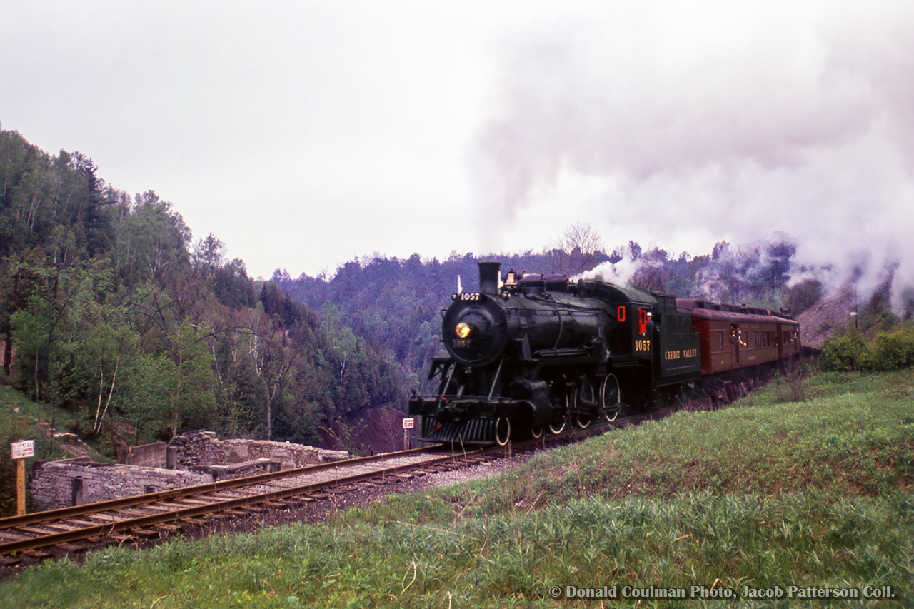 CVR 1057 leads the Ontario Rail Association's fall excursion to Owen Sound through the Credit Valley passing the mill ruins at Cataract.

Donald Coulman Photo, Jacob Patterson Collection Slide.