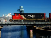 A broadside view of ex-GO Transit CN 9677 in the Port of Montreal.