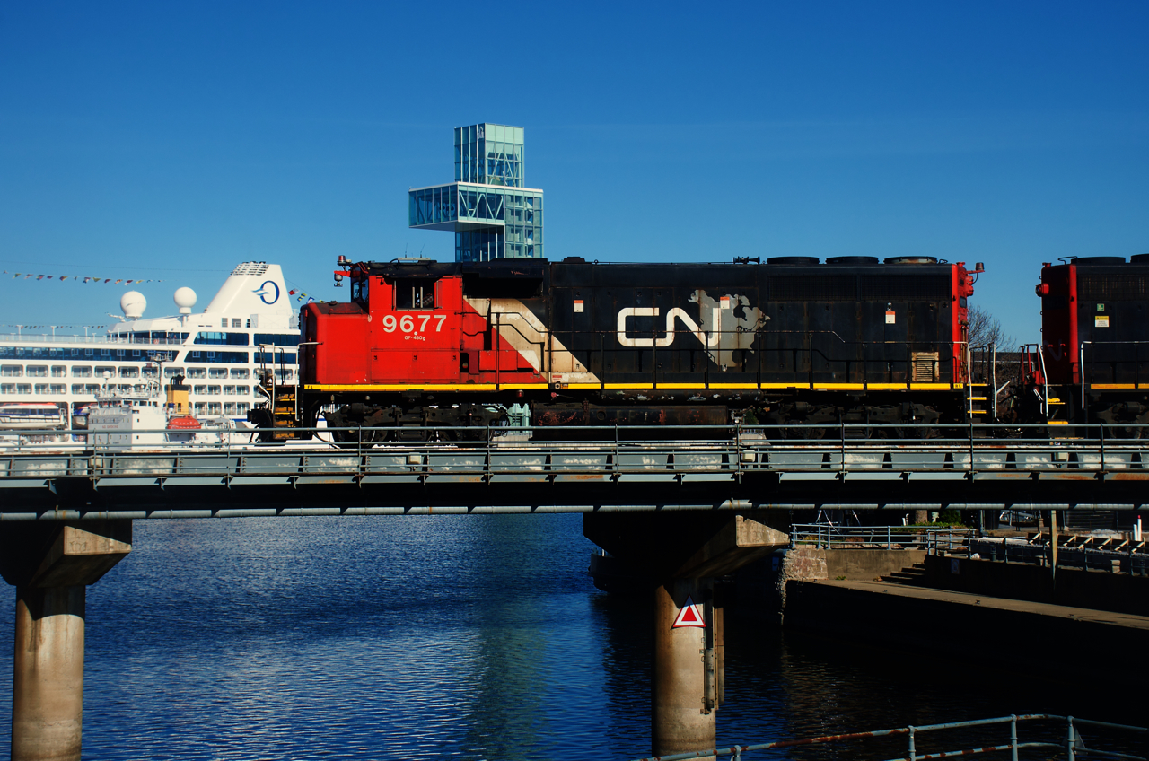 A broadside view of ex-GO Transit CN 9677 in the Port of Montreal.