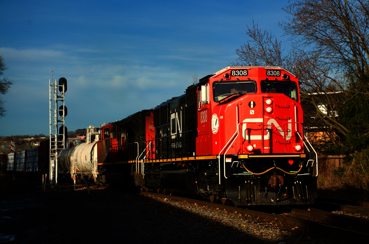 CN 322 in Montreal on Friday morning with a rebuilt leader (SD75ACC CN 8308). It was rebuilt from SD75I CN 5662. It's nice to see these getting rebuilt and that they retained their teardrop windshields.