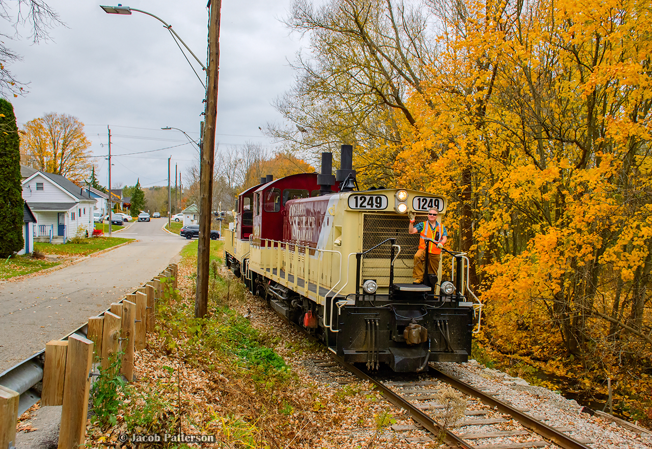 The annual increase in fall propane traffic is underway on the OSR, requiring the St. Thomas job to resume its full Mon - Fri schedule. With a heavy day of switching complete, Conductor Lucas rides the point through Ingersoll as they return to the Salford shop.