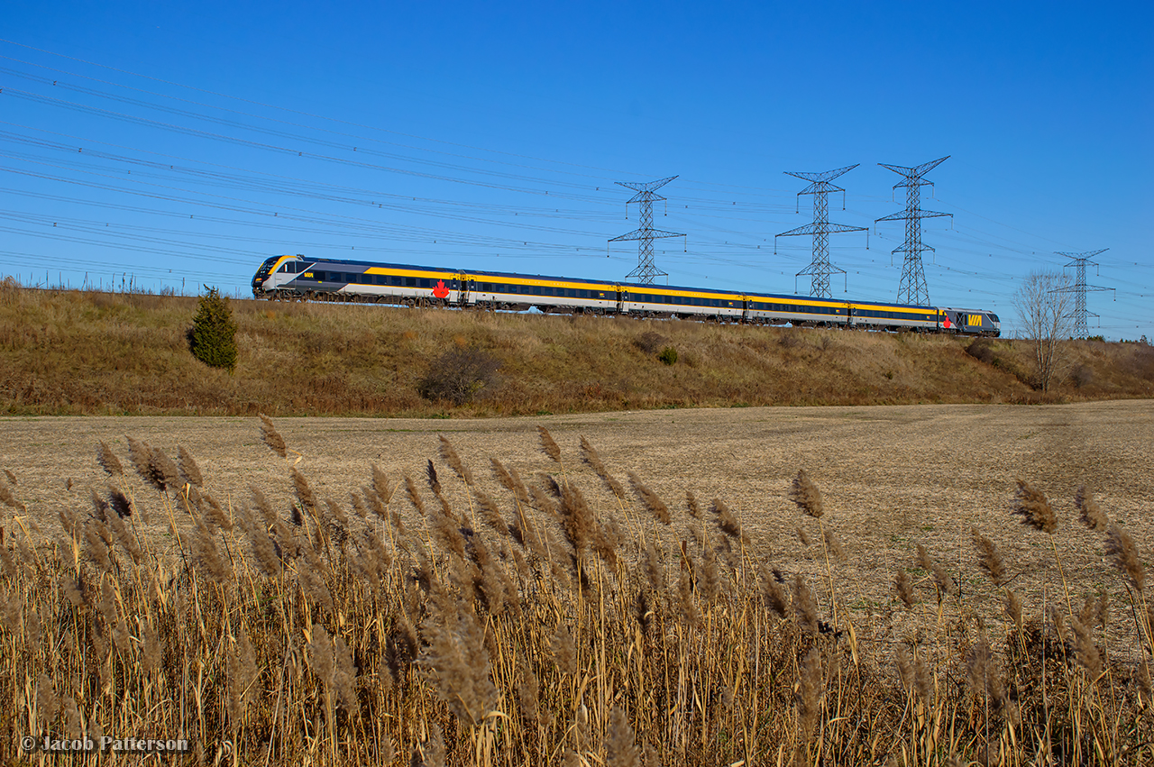 While Metrolinx projects were underway on the Kingston Sub over the weekend, VIA was detouring their trains over the York and Bala Subs around the work block.  Here, a delayed 643 is about halfway between Pickering Junction and Doncaster, passing mile 9 of the York Sub.  Via 63 with 904 leading will follow about six minutes behind.