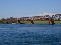 Shortly after CN 531's departure to Buffalo, NS C93 slowly trundles across the International Bridge into Fort Erie.