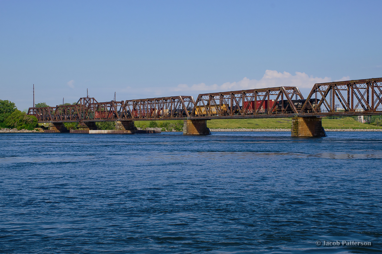 Shortly after CN 531's departure to Buffalo, NS C93 slowly trundles across the International Bridge into Fort Erie.