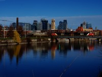 Gleaming CN 3377 leads CN 120 over the Lachine Canal with intermodal traffic for The Maritimes.