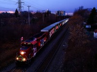 CPKC 01H-24 in Montreal West right at sunset, on its way to the first stop of the night in Kahnawake.