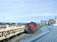 <b> Heterochromia </b> <br>
Bi-eyed number boards on HLCX 3840 stand out quite nicely on this beautiful sunlit August morning. <br>
As VIA 693 The Hudson Bay slowly reverses onto the station track at Churchill, MB I was able to catch quite a selection of revenue and OCS rolling stock in the HBRY yard. <br>
Nearby in the background, the Port of Churchill grain silos and elevators wait in silent anticipation for the opportunity to be reactivated at some date in the not-too-distant future.