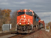 Westbound on the South Track about to cross Mainway, trailing units are GECX 2037 and CN 8307. Congestion on the Oakville Sub. will have this westbound stopping at Burlington West for two eastbound trains heading up the Halton Sub..


