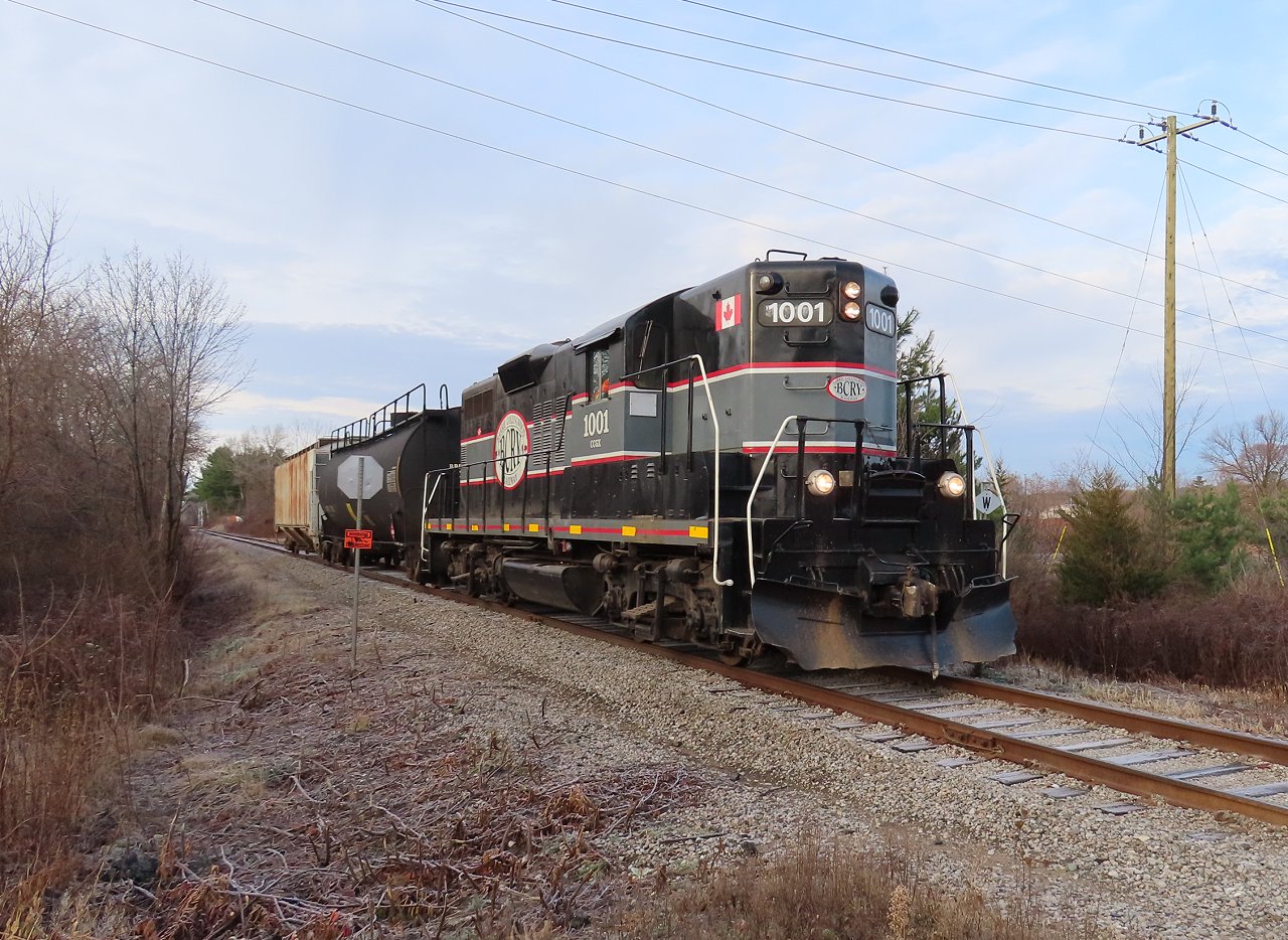 The Monday train approaches Patterson Road in Barrie. Its hard to beat a 66 year old good looking high hood GP-9. Before Cando took over the Meaford and Beeton subdivisions the last high hood I saw in Barrie was CN 4385 back in 1988.