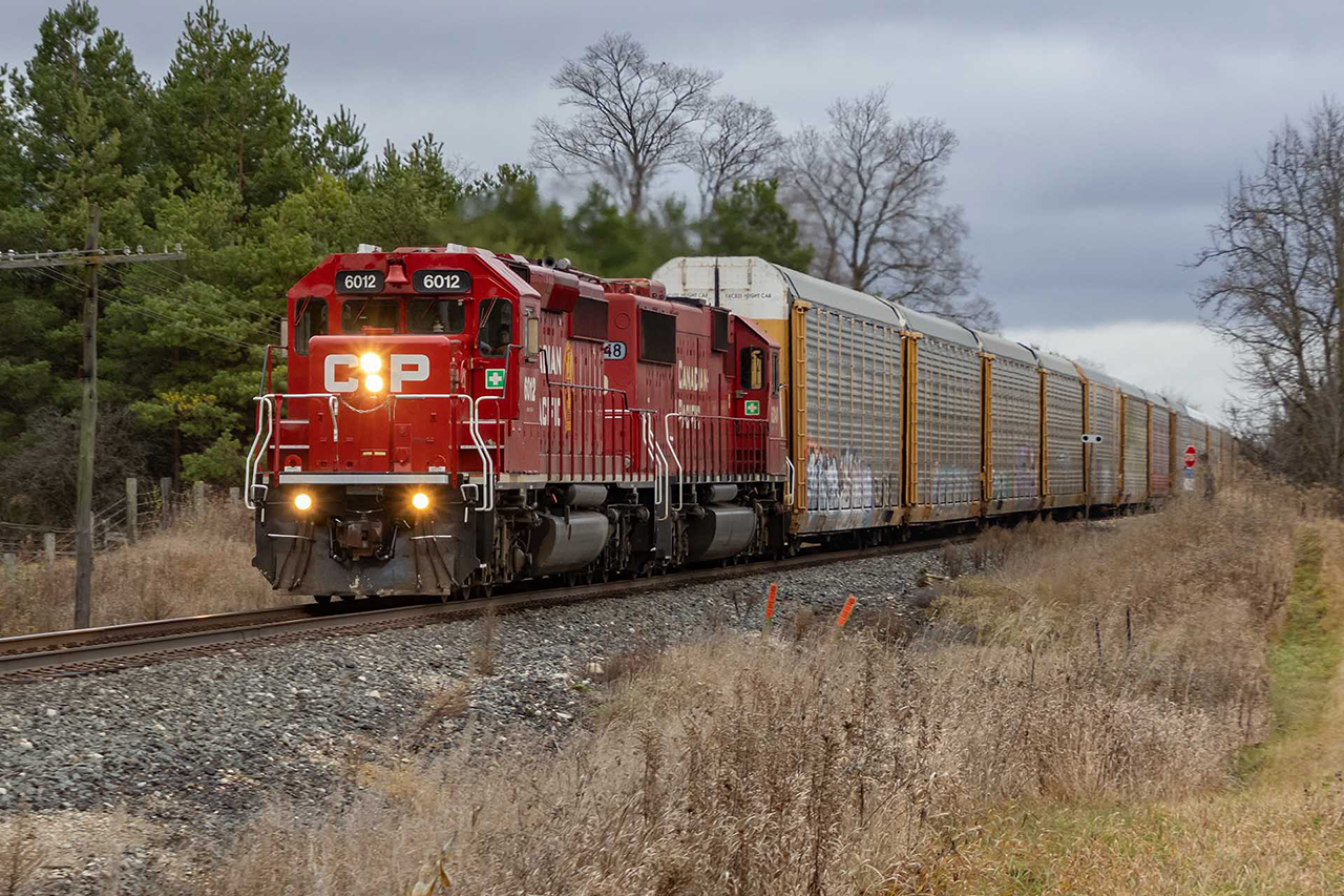 There are some things that will never happen again....at least that's what you tell yourself each time you see it. SD40-2's are pretty common on rail and work trains and are still a delight to see. How about one leading the hottest rain on the London Division? Along with SD60 6248, 6012 is delighting in a short train of 40 empty multis putting out a sound that is so 1990...perfect. I wonder if I'll ever see that again?