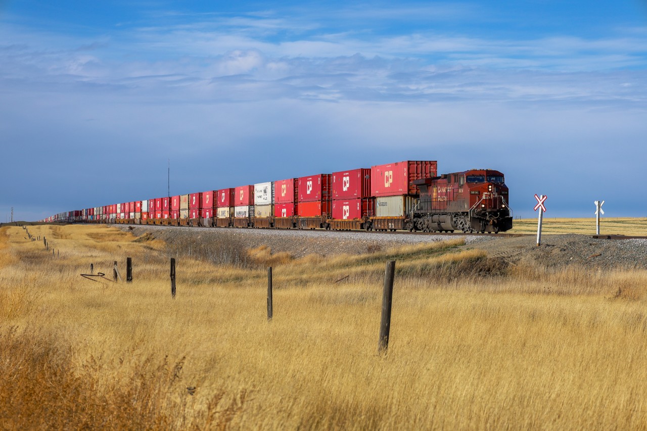 CPKC’s premiere intermodal train 100-01 cruises across the Brooks Sub, departing Bowell - next stop Medicine Hat!