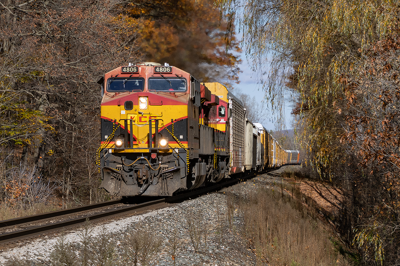 The road to Orr's Lake Hill west of Cambridge is open again after 6 months. So you'd naturally expect to see 2 KCS GE's lugging a 6 hours late 135 just about to dig into there real grade of the hill.