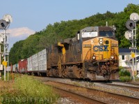 CSX Yn-2 duo powering CN M32721 23 towards Huntingdon, QC from Montréal Taschereau Yard, QC by Mile 34.6 Kingston sub.