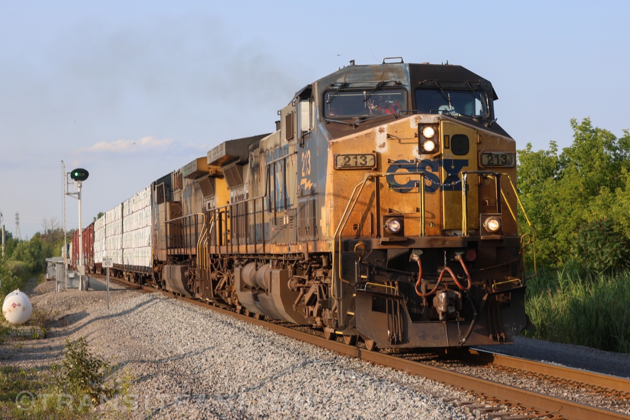 CSX Yn-2 duo powering CN M32721 23 towards Huntingdon, QC from Montréal Taschereau Yard, QC by Mile 210.5 CSX Montreal sub.