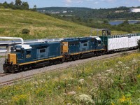 A pair of ex CSX geeps returning to Island yard after switched Irving Paper plant in Saint John East.