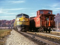 Toronto - North Bay train 459, led by F7s 1519, 1521, hold the main at the north end of Rosedale in the Don Valley while North Bay - Toronto train 452 behind RS3s 1300, 1311 takes the siding.

<br><br><i>Scan and editing by Jacob Patterson.</i>