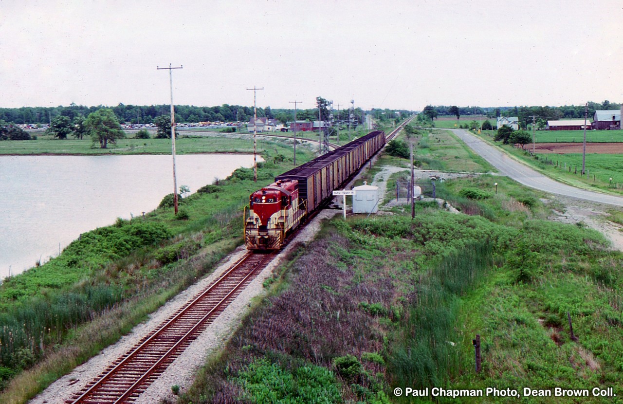 TH&B GP7 73 at Yager West heads for Port Colborne on the CN Humberstone Sub.