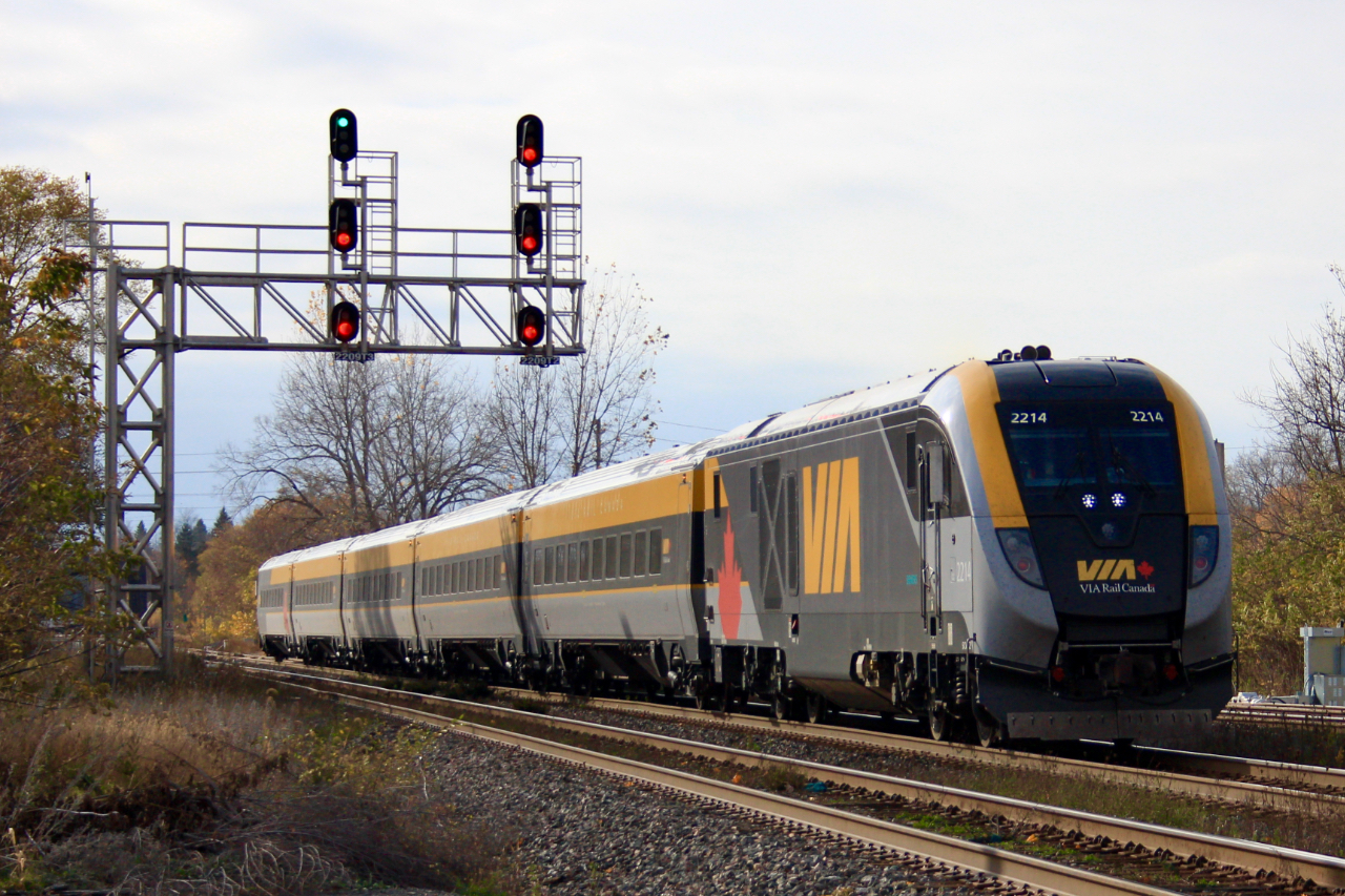 An exceptionally warm Halloween Day finds VIA Rail Corridor Service train #42 to Ottawa, Trainset 2213/14 passing under the West end signals at Belleville Station, Ontario. It was all treats and no tricks as my first time catching one of the new Siemens Venture trainsets.