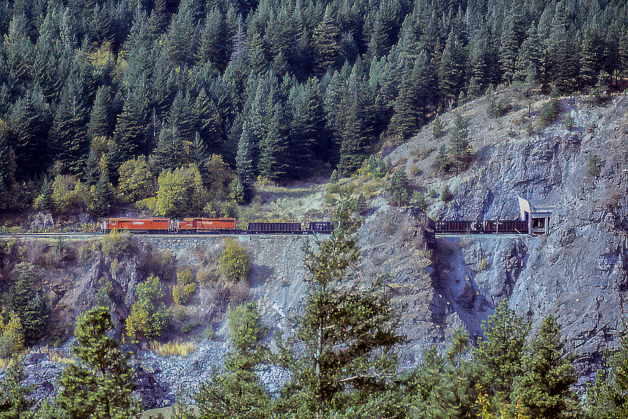 In the days before directional running, and GE's, CP was SD40-2's....plus the 25 F's. On the mainline out west, that was it. The only question was the number. For most unit trains, 2 or 3 plus 2 mid was standard. The tail end of this train is still on the Cisco bridge as coal loads head for Vancouver.